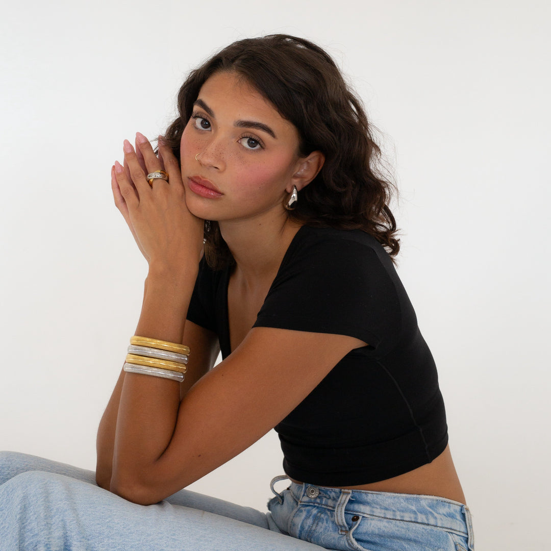 Model wearing Two tone Snake Bangle Bracelet #color_gold