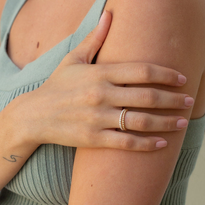 gold and silver beaded ring