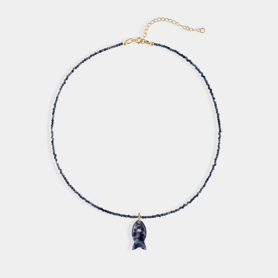 Blue sapphire bead necklace with small carved blue stone charm