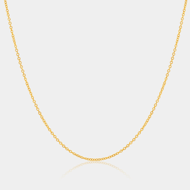 14k gold filled cable chain on a light gray background