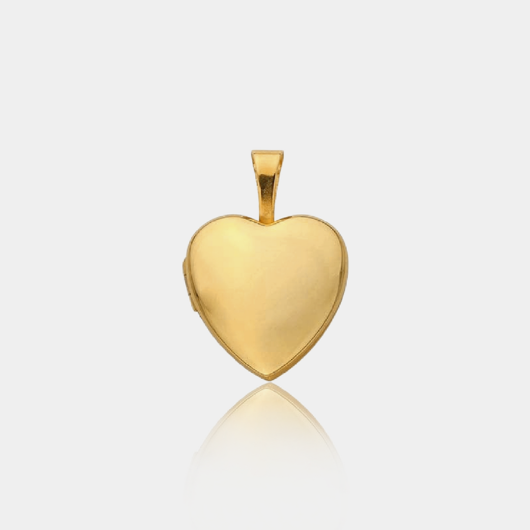 Gold heart-shaped locket on a light gray background