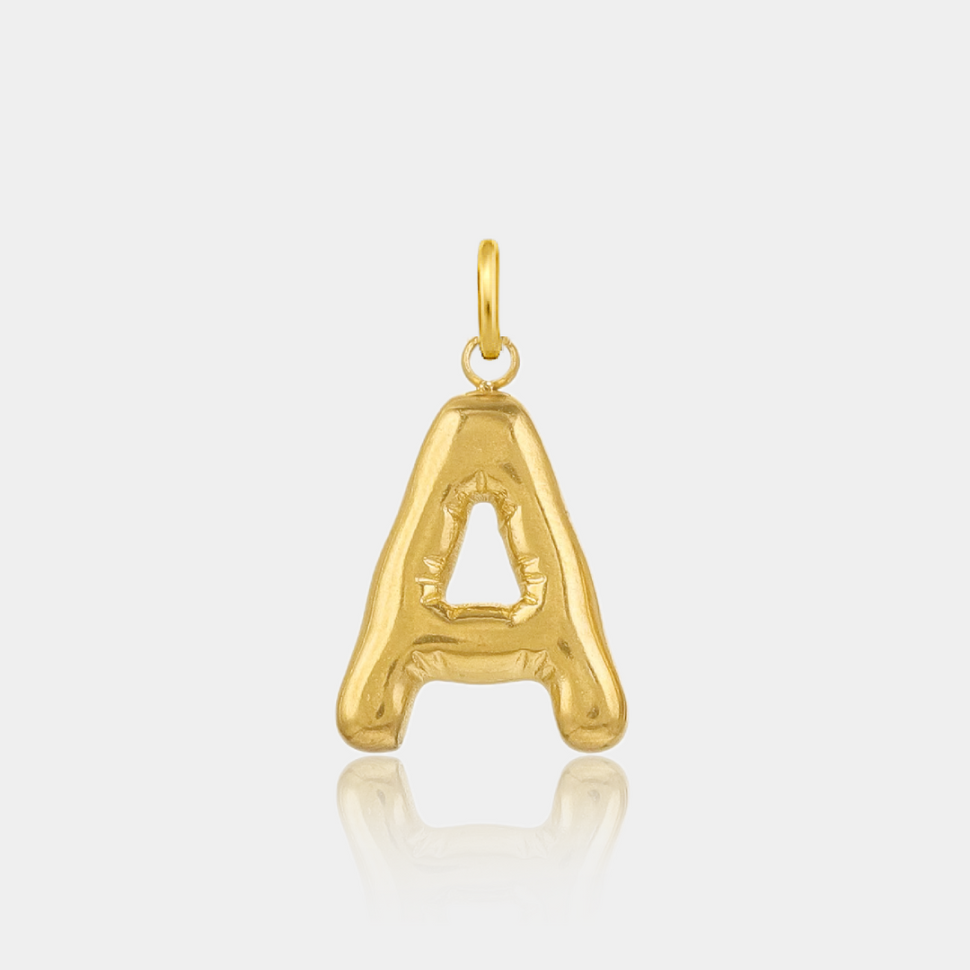 Gold initial letter 'A' pendant charm on a light gray background #letter_a