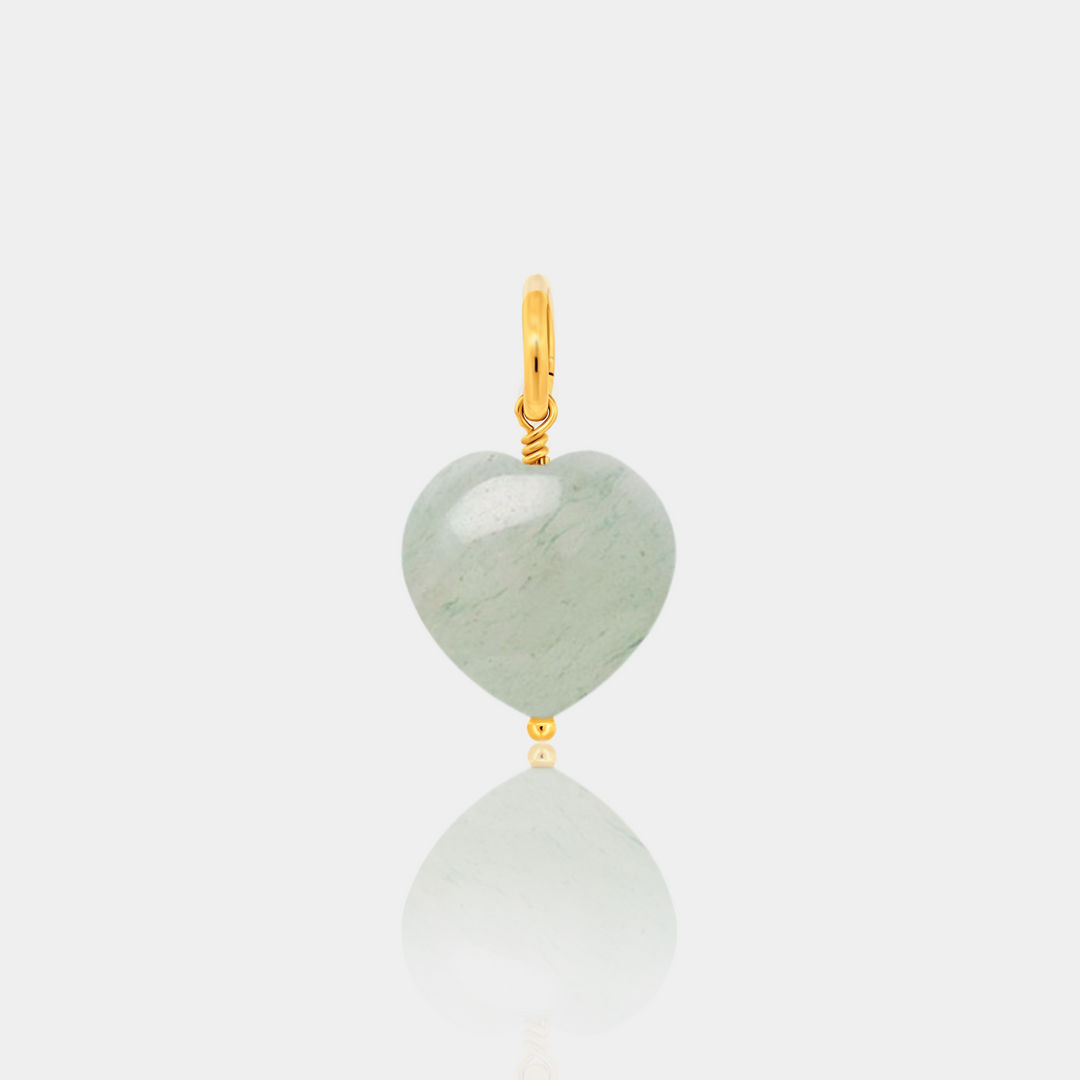 Aventurine heart-shaped pendant with gold-filled accents on a light gray background