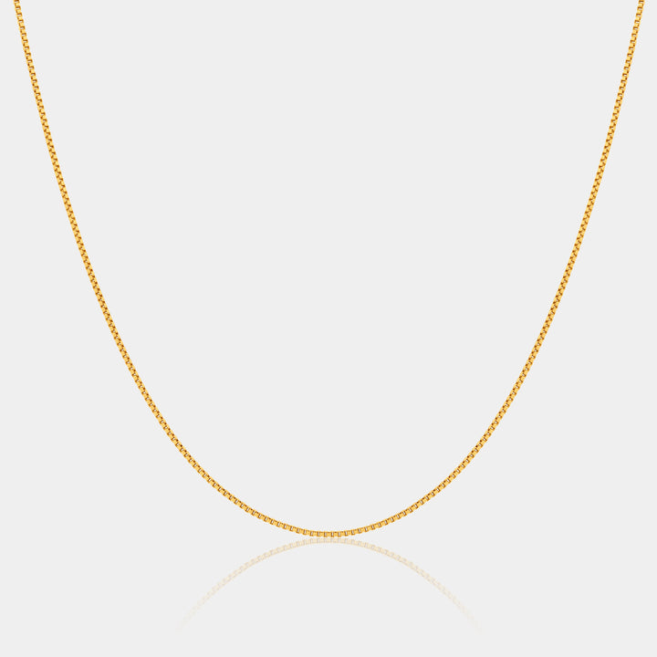 14k gold filled venetian box chain necklace on a light gray background