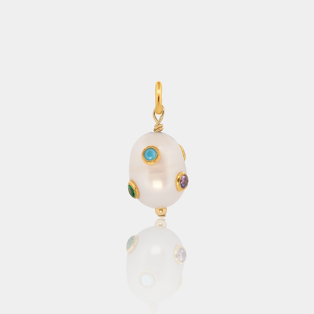 Freshwater Pearl Charm with studded colorful Cubic Zirconias on a light gray background