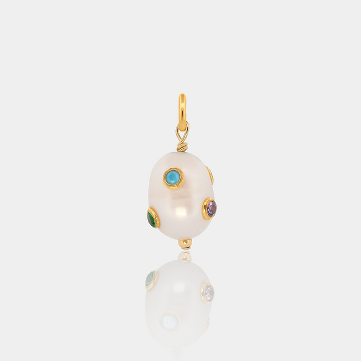 Freshwater Pearl Charm with studded colorful Cubic Zirconias on a light gray background